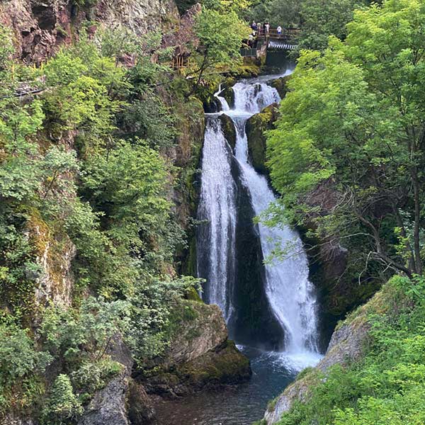 White Drin Waterfall surrounded by trees in kosovo