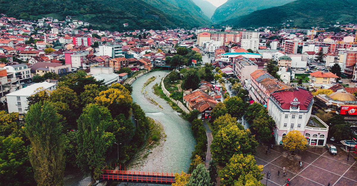 A view of the city of Peja, Kosovo with river crossing through