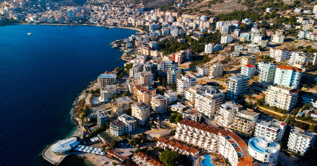 A beach scene at sunset in Saranda, Albania.