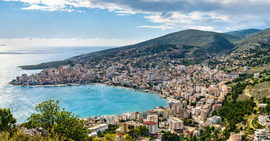 city view of a waves crashing on the shore in Vlore, Albania.